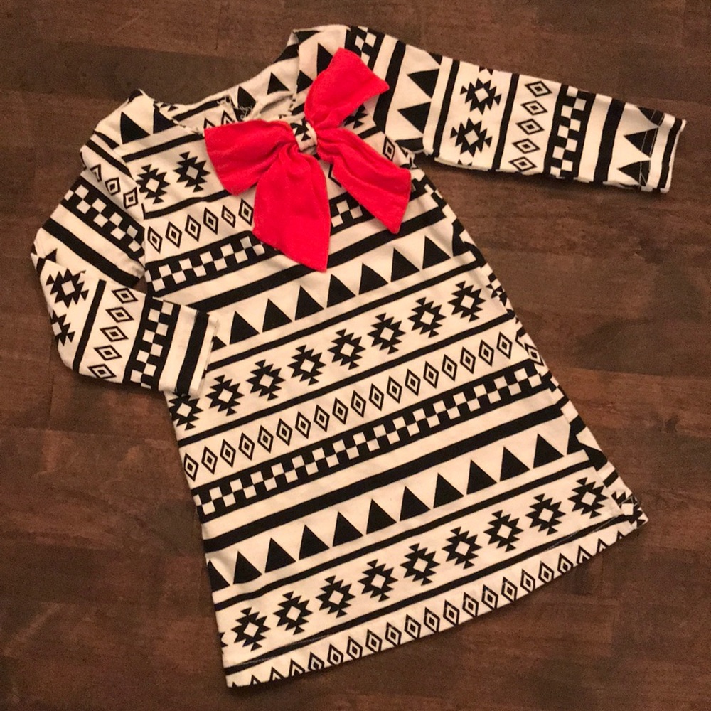 Black and white dress with red accent bow